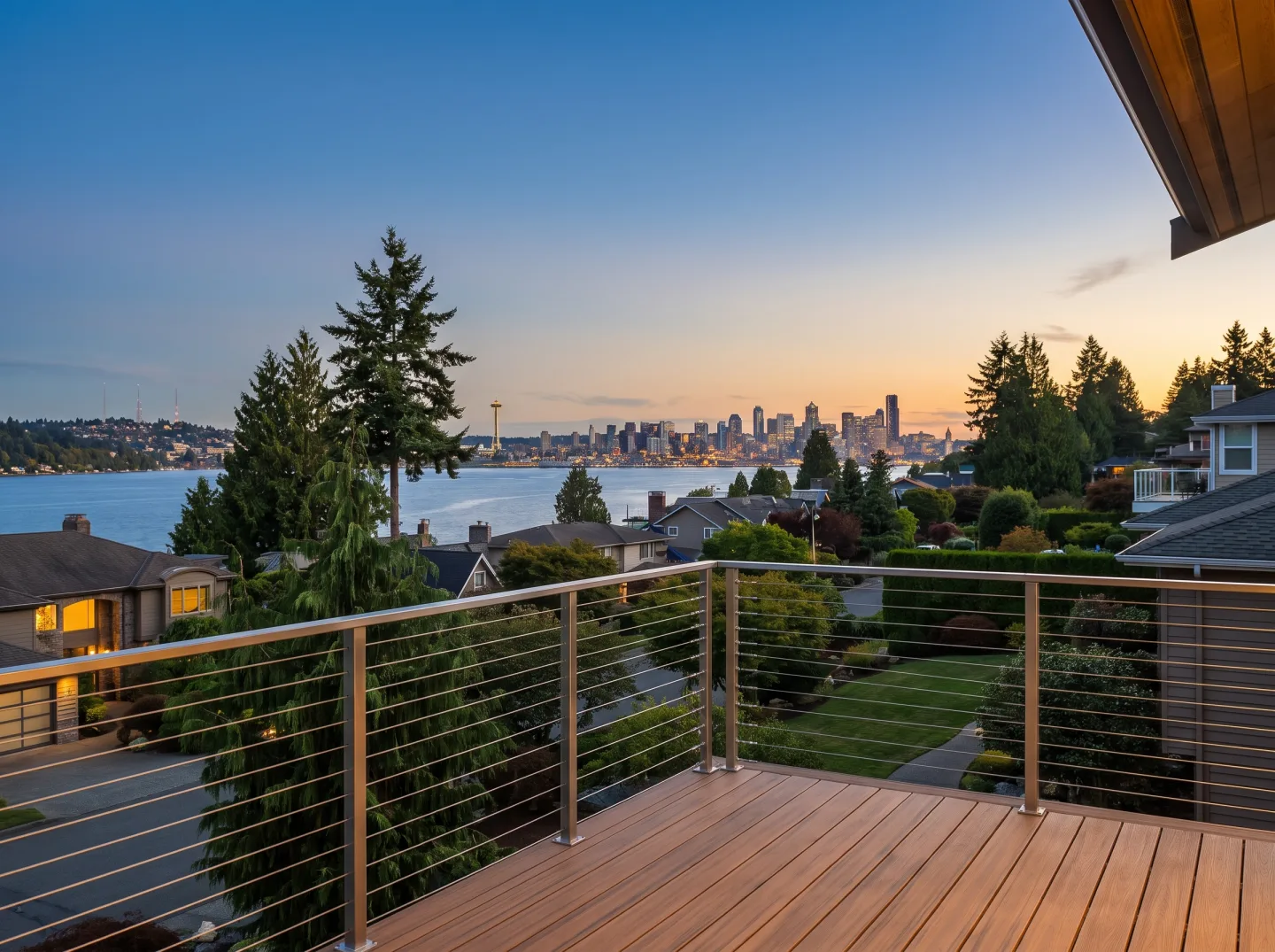 Hillside view deck with cable railing in Clyde Hill overlooking Lake Washington